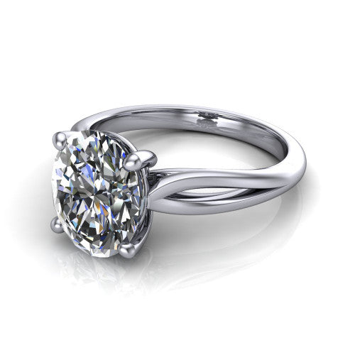Beatrice oval solitaire engagement ring in 18K White Gold, three-quarter perspective showing the brilliant oval center diamond on a slim polished band with trellis crossover gallery