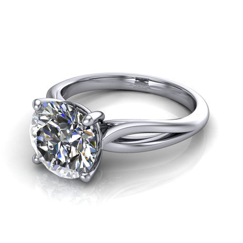 Beatrice round solitaire engagement ring in Platinum, three-quarter perspective showing the brilliant round center diamond on a slim polished band with trellis crossover gallery