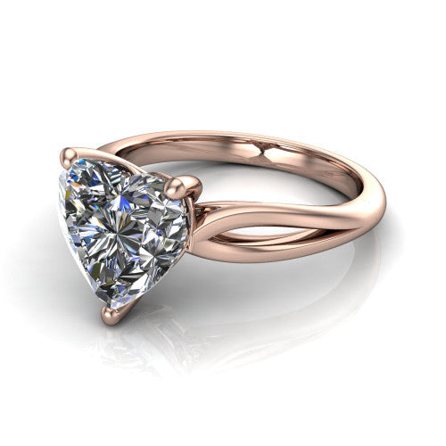 Beatrice heart solitaire engagement ring in 18K Rose Gold, three-quarter perspective showing the brilliant heart-shaped center diamond on a slim polished band with trellis crossover gallery