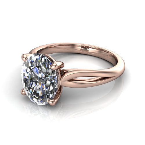 Beatrice oval solitaire engagement ring in 18K Rose Gold, three-quarter perspective showing the brilliant oval center diamond on a slim polished band with trellis crossover gallery