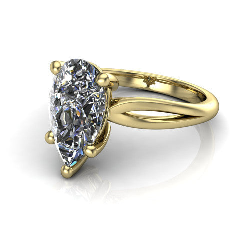 Beatrice pear solitaire engagement ring in 14K Yellow Gold, three-quarter perspective showing the brilliant pear-cut center diamond on a slim polished band with trellis crossover gallery