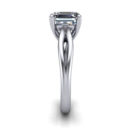 Beatrice square emerald solitaire engagement ring in 18K White Gold, side profile showing the trellis crossover arms beneath the head and slim polished band