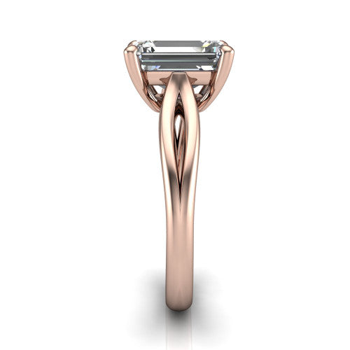 Beatrice emerald solitaire engagement ring in 18K Rose Gold, side profile showing the trellis crossover arms beneath the head and slim polished band