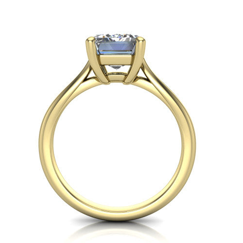 Beatrice emerald solitaire engagement ring in 14K Yellow Gold, through-finger front profile showing the trellis crossover under-gallery and cathedral lift