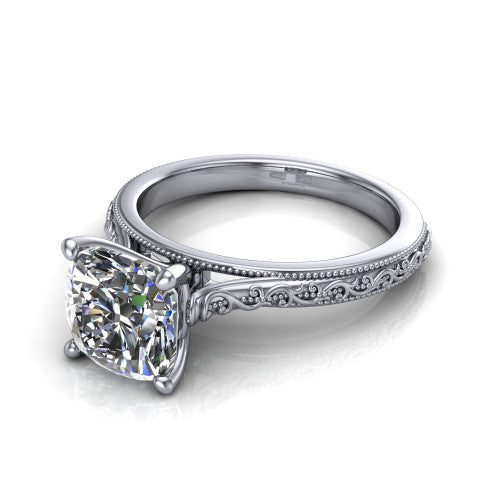 Violet cushion solitaire engagement ring in 18K White Gold, three-quarter perspective showing the brilliant cushion-cut center diamond on a hand-engraved scroll shank with milgrain edges