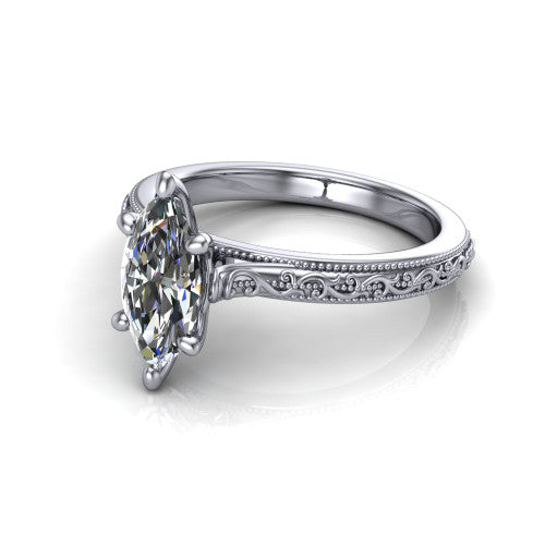 Violet marquise solitaire engagement ring in Platinum, three-quarter perspective showing the brilliant marquise center diamond on a hand-engraved scroll shank with milgrain edges