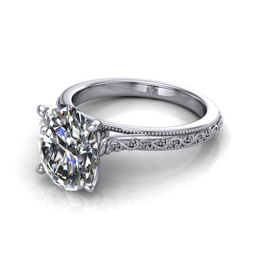 Violet oval solitaire engagement ring in 14K White Gold, three-quarter perspective showing the brilliant oval center diamond on a hand-engraved scroll shank with milgrain edges