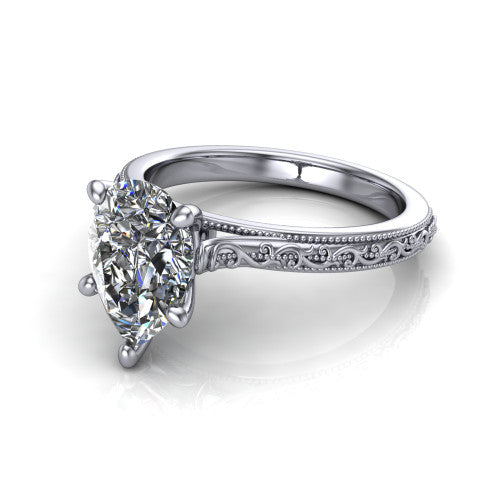 Violet pear solitaire engagement ring in Platinum, three-quarter perspective showing the brilliant pear-cut center diamond on a hand-engraved scroll shank with milgrain edges