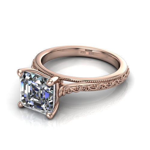 Violet square emerald solitaire engagement ring in 14K Rose Gold, three-quarter perspective showing the step-cut square emerald center diamond on a hand-engraved scroll shank with milgrain edges