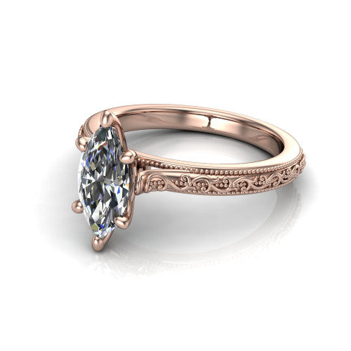 Violet marquise solitaire engagement ring in 18K Rose Gold, three-quarter perspective showing the brilliant marquise center diamond on a hand-engraved scroll shank with milgrain edges