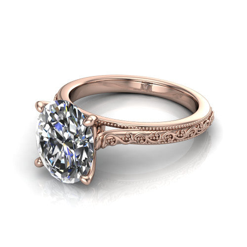 Violet oval solitaire engagement ring in 14K Rose Gold, three-quarter perspective showing the brilliant oval center diamond on a hand-engraved scroll shank with milgrain edges