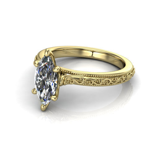 Violet marquise solitaire engagement ring in 18K Yellow Gold, three-quarter perspective showing the brilliant marquise center diamond on a hand-engraved scroll shank with milgrain edges
