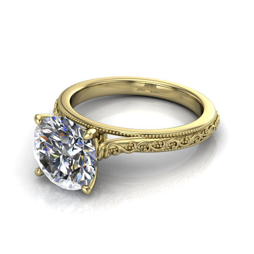 Violet round solitaire engagement ring in 18K Yellow Gold, three-quarter perspective showing the brilliant round center diamond on a hand-engraved scroll shank with milgrain edges