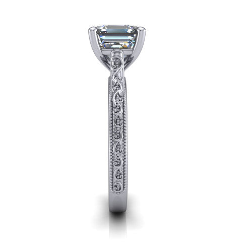 Violet square emerald solitaire engagement ring in Platinum, side profile showing the hand-engraved scroll motif and milgrain bead edges along the shank