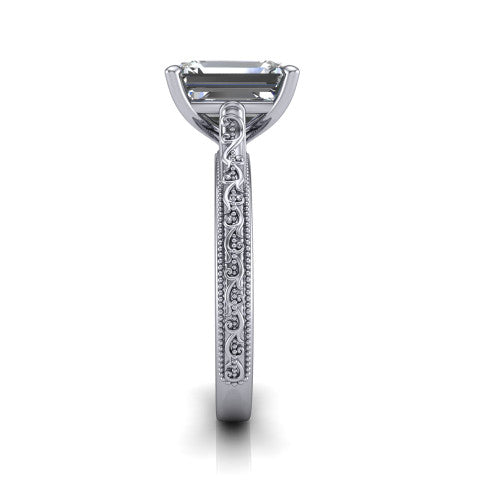 Violet emerald solitaire engagement ring in 14K White Gold, side profile showing the hand-engraved scroll motif and milgrain bead edges along the shank