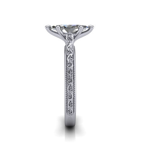 Violet marquise solitaire engagement ring in Platinum, side profile showing the hand-engraved scroll motif and milgrain bead edges along the shank