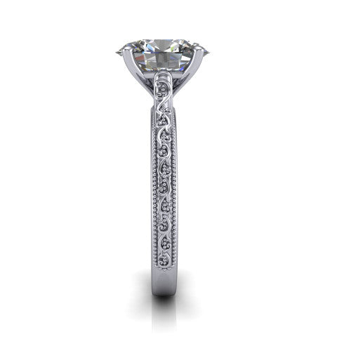 Violet oval solitaire engagement ring in Platinum, side profile showing the hand-engraved scroll motif and milgrain bead edges along the shank