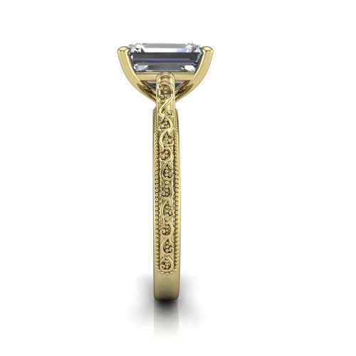 Violet emerald solitaire engagement ring in 18K Yellow Gold, side profile showing the hand-engraved scroll motif and milgrain bead edges along the shank