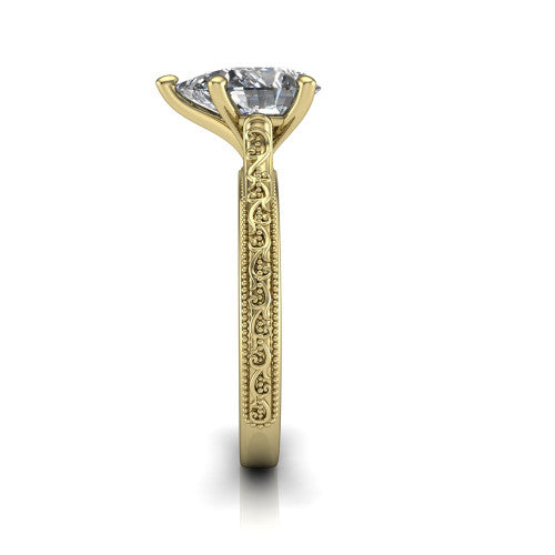 Violet pear solitaire engagement ring in 14K Yellow Gold, side profile showing the hand-engraved scroll motif and milgrain bead edges along the shank