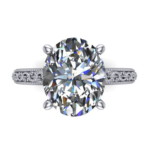 Violet oval solitaire engagement ring in Platinum, top-down view showing the brilliant oval center diamond held by four prongs above the engraved shank