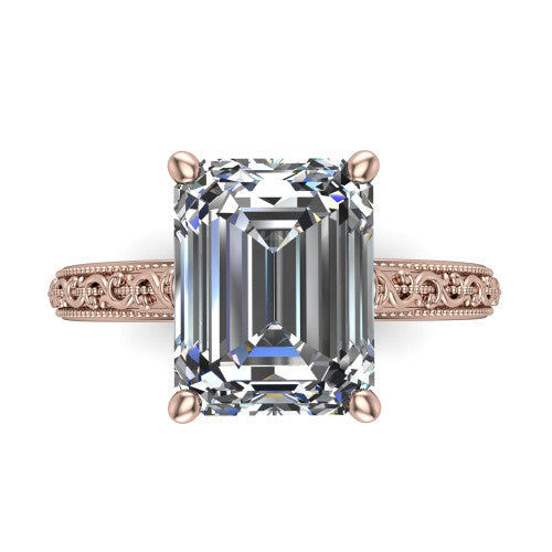 Violet emerald solitaire engagement ring in 14K Rose Gold, top-down view showing the step-cut emerald center diamond held by four prongs above the engraved shank