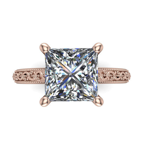 Violet princess solitaire engagement ring in 14K Rose Gold, top-down view showing the brilliant princess-cut center diamond held by four prongs above the engraved shank