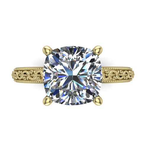 Violet cushion solitaire engagement ring in 14K Yellow Gold, top-down view showing the brilliant cushion-cut center diamond held by four prongs above the engraved shank
