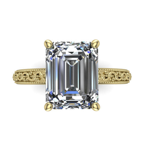 Violet emerald solitaire engagement ring in 14K Yellow Gold, top-down view showing the step-cut emerald center diamond held by four prongs above the engraved shank