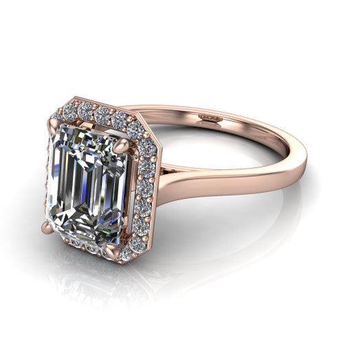 Anastasia emerald halo engagement ring in 14K Rose Gold, three-quarter perspective showing the step-cut emerald center diamond inside a slim pave halo on cathedral shoulders