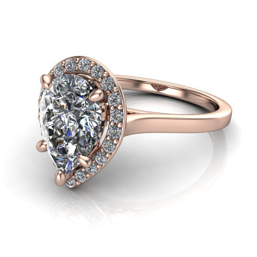 Anastasia pear halo engagement ring in 14K Rose Gold, three-quarter perspective showing the brilliant pear-cut center diamond inside a slim pave halo on cathedral shoulders