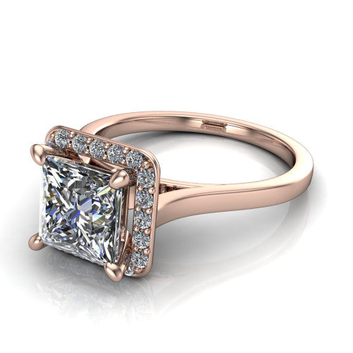 Anastasia princess halo engagement ring in 18K Rose Gold, three-quarter perspective showing the brilliant princess-cut center diamond inside a slim pave halo on cathedral shoulders