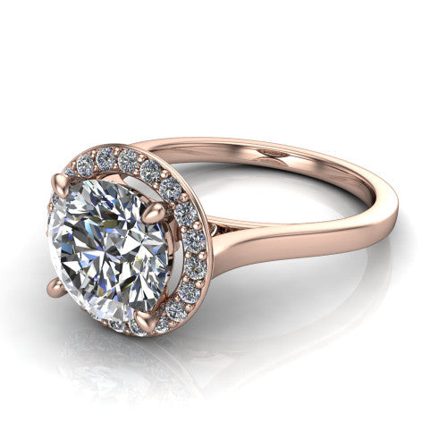 Anastasia round halo engagement ring in 18K Rose Gold, three-quarter perspective showing the brilliant round center diamond inside a slim pave halo on cathedral shoulders