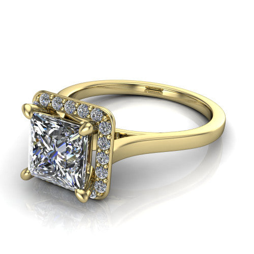 Anastasia princess halo engagement ring in 18K Yellow Gold, three-quarter perspective showing the brilliant princess-cut center diamond inside a slim pave halo on cathedral shoulders