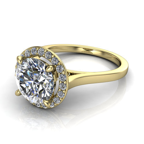 Anastasia round halo engagement ring in 18K Yellow Gold, three-quarter perspective showing the brilliant round center diamond inside a slim pave halo on cathedral shoulders