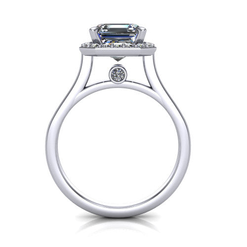 Anastasia square emerald halo engagement ring in Platinum, through-finger front profile showing the halo head, cathedral shoulders, and hidden surprise diamond in the under-gallery
