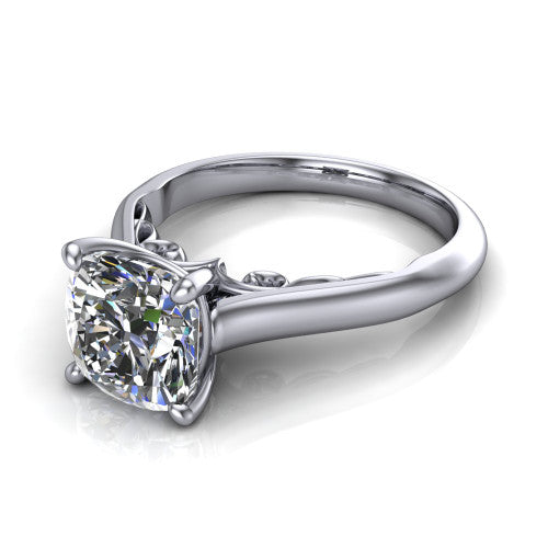 Saylor cushion solitaire engagement ring in 18K White Gold, three-quarter perspective showing the brilliant cushion-cut center diamond on a 4-prong cathedral head with filigree gallery