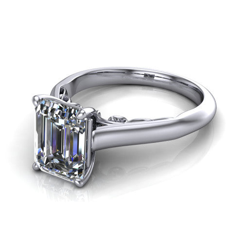 Saylor emerald solitaire engagement ring in Platinum, three-quarter perspective showing the step-cut emerald center diamond on a 4-prong cathedral head with filigree gallery