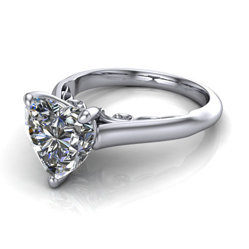 Saylor heart solitaire engagement ring in 14K White Gold, three-quarter perspective showing the brilliant heart-shaped center diamond on a 4-prong cathedral head with filigree gallery