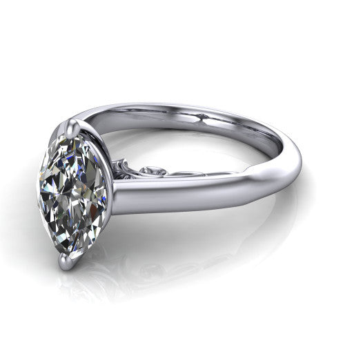 Saylor marquise solitaire engagement ring in 18K White Gold, three-quarter perspective showing the brilliant marquise center diamond on a 4-prong cathedral head with filigree gallery