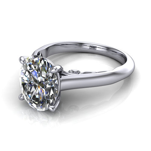 Saylor oval solitaire engagement ring in Platinum, three-quarter perspective showing the brilliant oval center diamond on a 4-prong cathedral head with filigree gallery