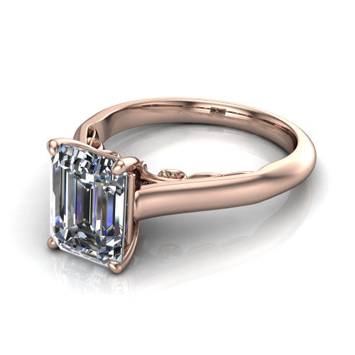 Saylor emerald solitaire engagement ring in 14K Rose Gold, three-quarter perspective showing the step-cut emerald center diamond on a 4-prong cathedral head with filigree gallery