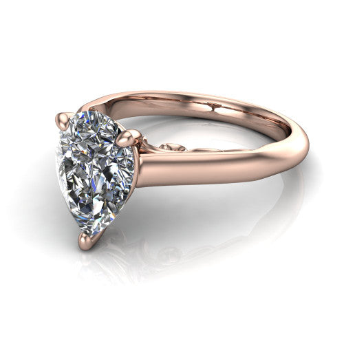 Saylor pear solitaire engagement ring in 14K Rose Gold, three-quarter perspective showing the brilliant pear-cut center diamond on a 4-prong cathedral head with filigree gallery