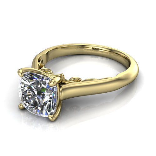 Saylor cushion solitaire engagement ring in 14K Yellow Gold, three-quarter perspective showing the brilliant cushion-cut center diamond on a 4-prong cathedral head with filigree gallery