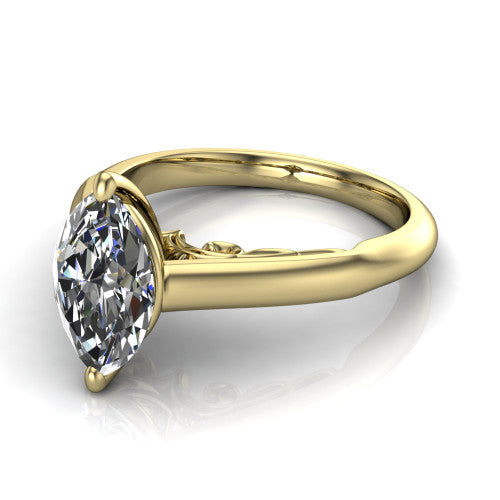 Saylor marquise solitaire engagement ring in 14K Yellow Gold, three-quarter perspective showing the brilliant marquise center diamond on a 4-prong cathedral head with filigree gallery