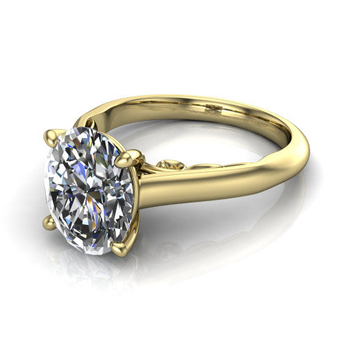 Saylor oval solitaire engagement ring in 14K Yellow Gold, three-quarter perspective showing the brilliant oval center diamond on a 4-prong cathedral head with filigree gallery
