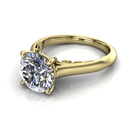 Saylor round solitaire engagement ring in 18K Yellow Gold, three-quarter perspective showing the brilliant round center diamond on a 4-prong cathedral head with filigree gallery