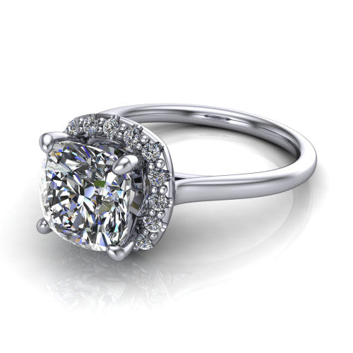 Florence cushion halo engagement ring in 18K White Gold, three-quarter perspective showing the brilliant cushion-cut center diamond inside a slim pave halo on a thin knife-edge band