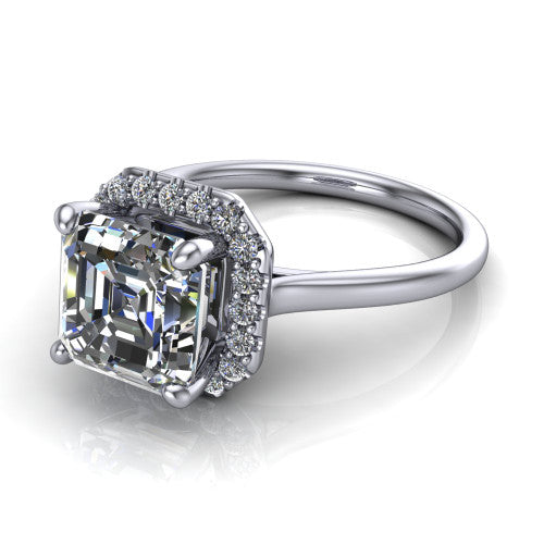 Florence square emerald halo engagement ring in 18K White Gold, three-quarter perspective showing the step-cut square emerald center diamond inside a slim pave halo on a thin knife-edge band