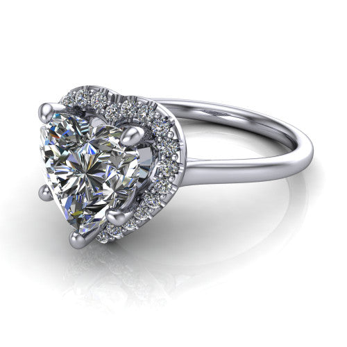 Florence heart halo engagement ring in Platinum, three-quarter perspective showing the brilliant heart-shaped center diamond inside a slim pave halo on a thin knife-edge band