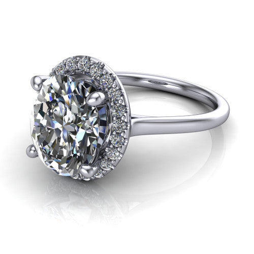 Florence oval halo engagement ring in 14K White Gold, three-quarter perspective showing the brilliant oval center diamond inside a slim pave halo on a thin knife-edge band